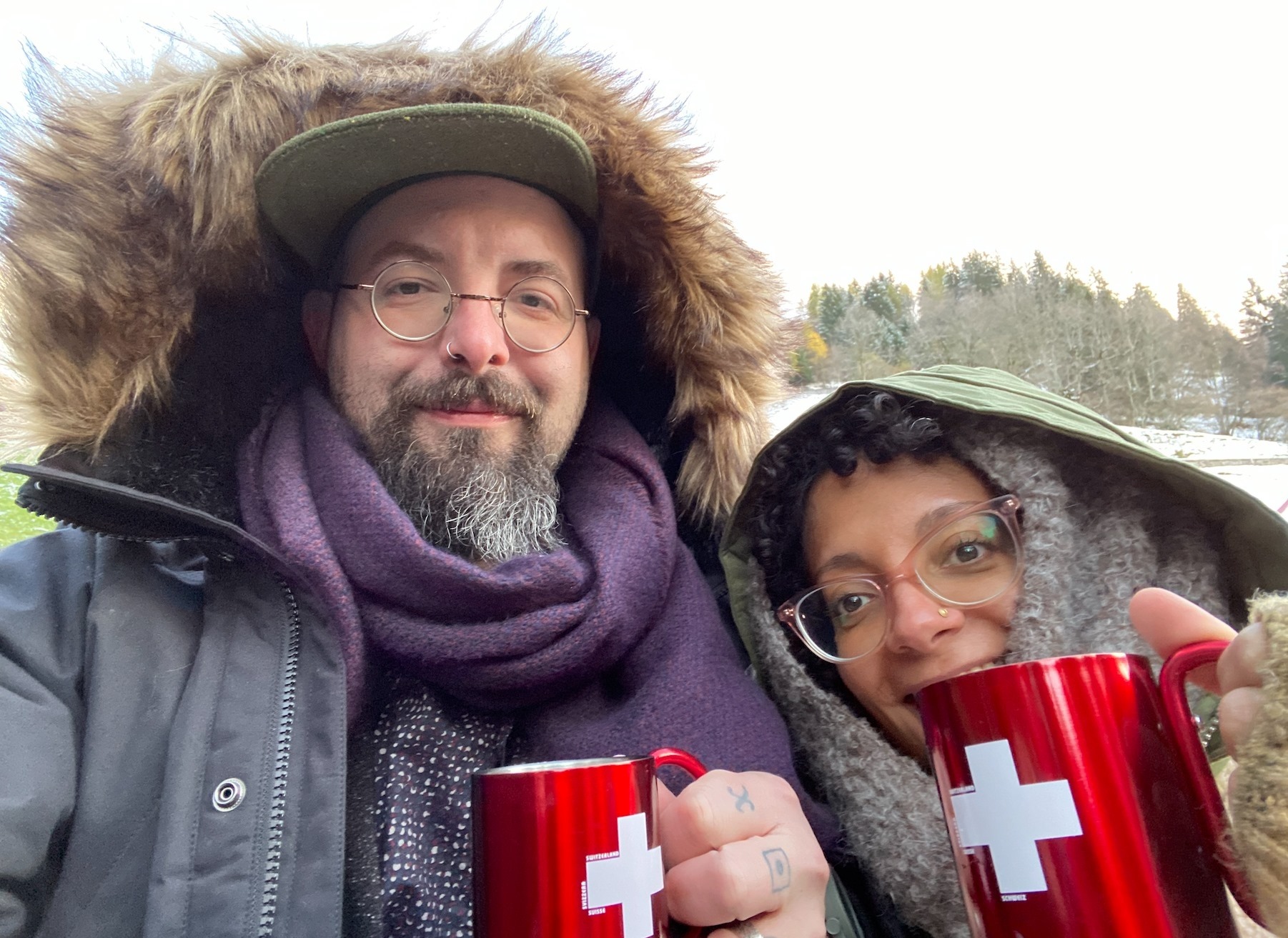 The author and his amazing wife sipping a bit of liquid warmth somewhere near Jungfrau, Switzerland, c. 2019